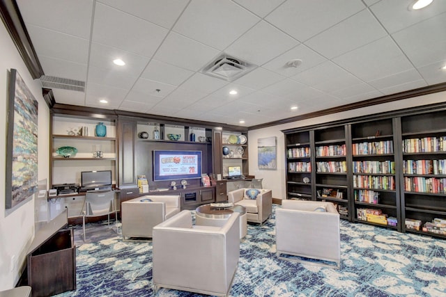 carpeted living area with built in shelves, ornamental molding, visible vents, and recessed lighting