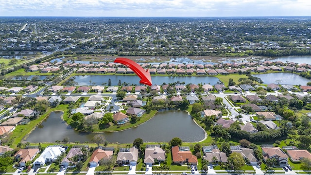 aerial view featuring a water view and a residential view