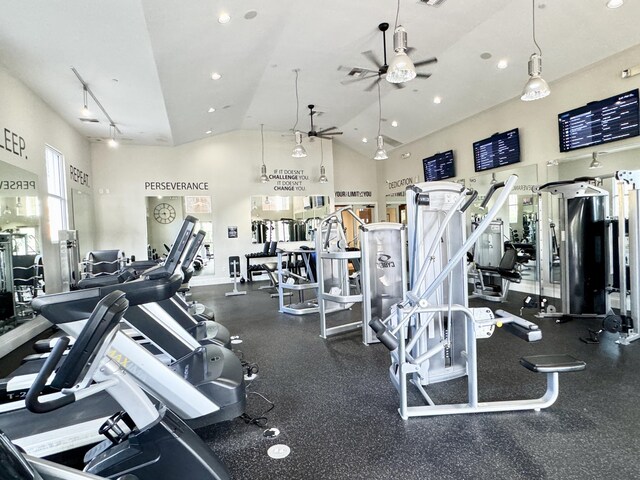 workout area featuring a ceiling fan, recessed lighting, vaulted ceiling, and baseboards