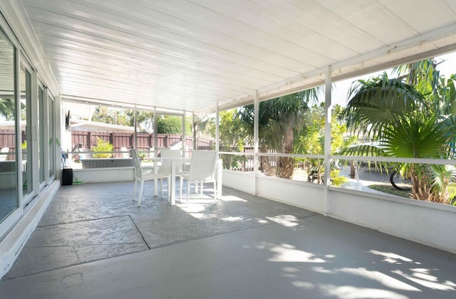 unfurnished sunroom with a healthy amount of sunlight