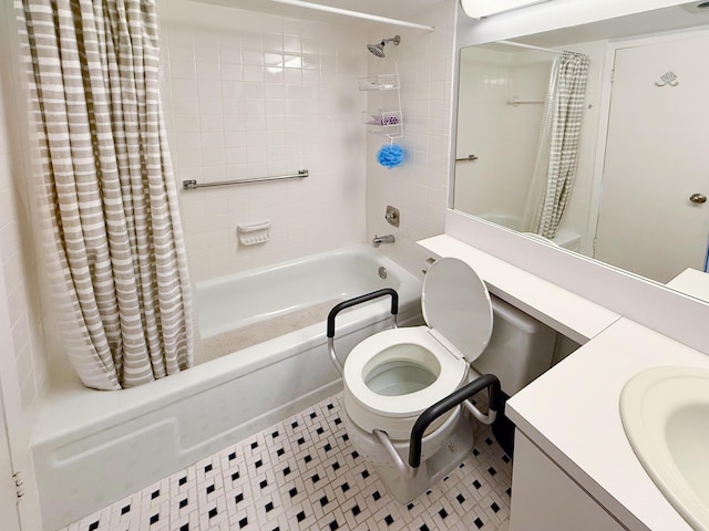 bathroom featuring vanity, shower / bath combo with shower curtain, toilet, and tile patterned floors