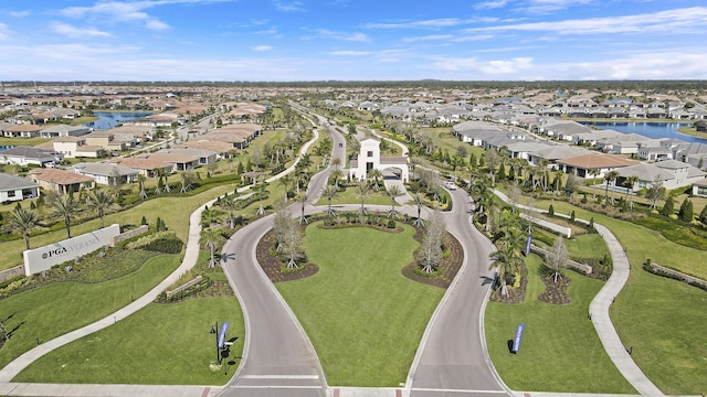 aerial view featuring a water view and a residential view