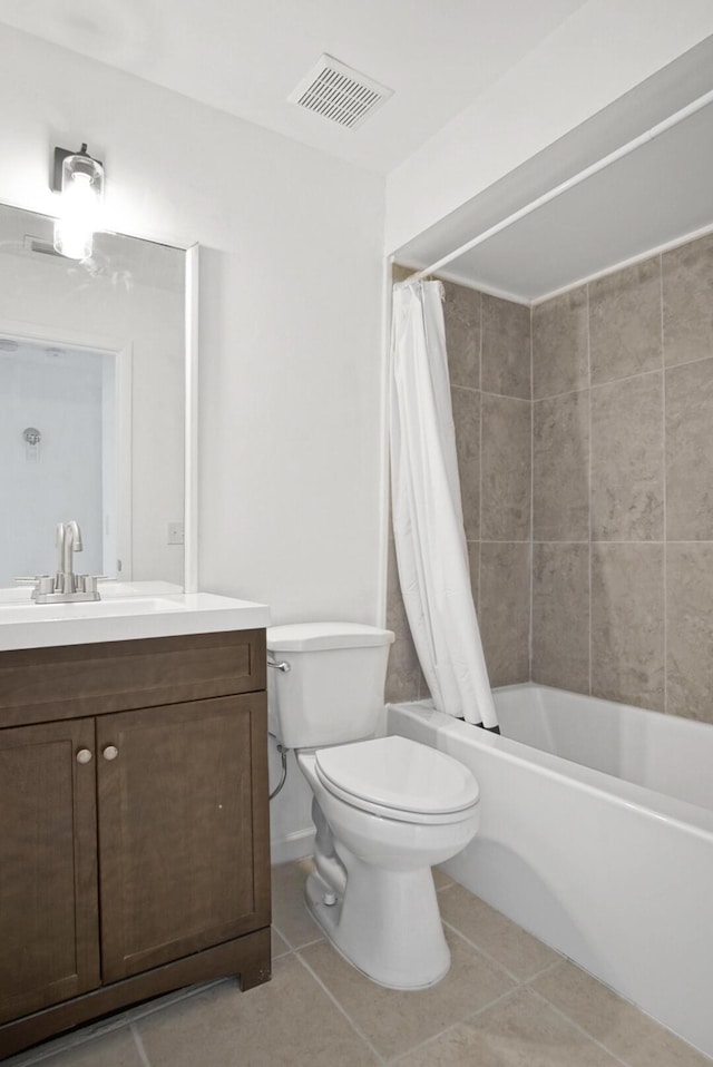 full bath featuring shower / bath combo, visible vents, toilet, tile patterned floors, and vanity