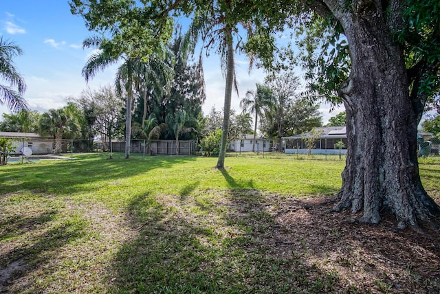 view of yard featuring fence