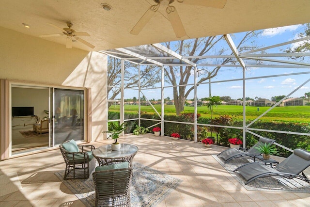 view of patio with a lanai