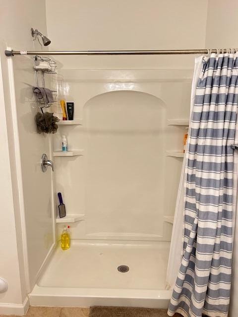 bathroom with a stall shower