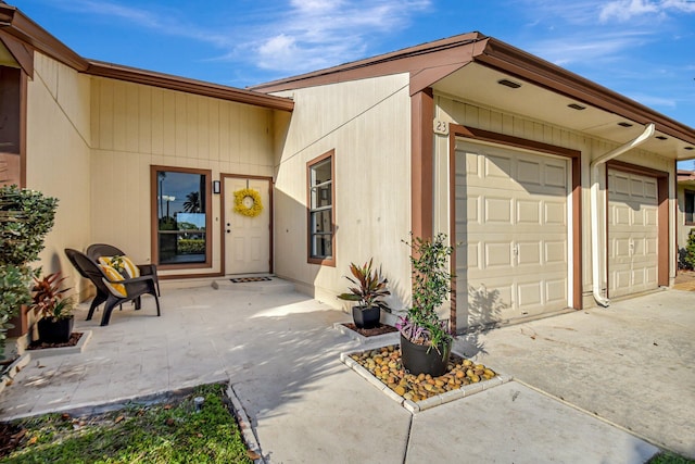 exterior space with an attached garage and driveway