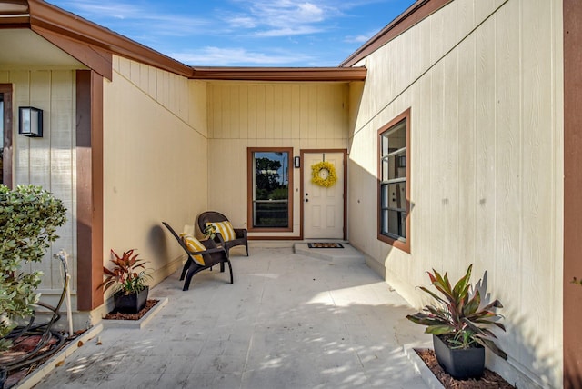 property entrance featuring a patio area