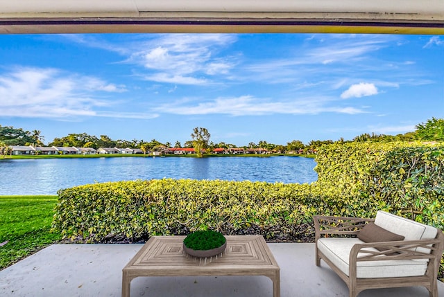 view of patio / terrace with a water view