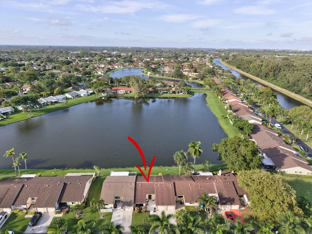 bird's eye view with a water view and a residential view