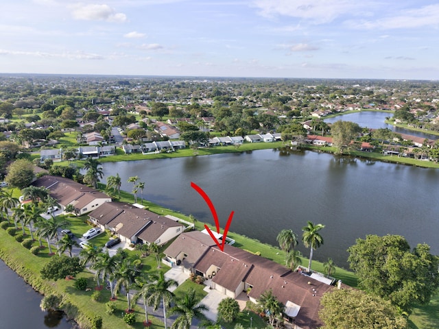 aerial view with a water view and a residential view