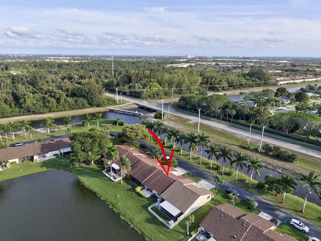 aerial view with a water view and a residential view