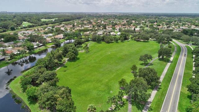 aerial view with a residential view and a water view