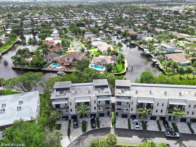 bird's eye view featuring a water view and a residential view