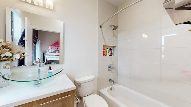 full bathroom featuring toilet, vanity, and shower / bathing tub combination