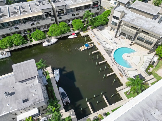 birds eye view of property featuring a water view