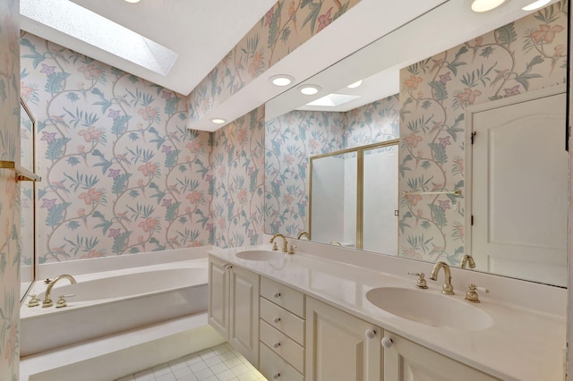 full bath with a skylight, a sink, and wallpapered walls