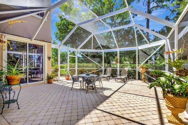 view of patio / terrace with a lanai