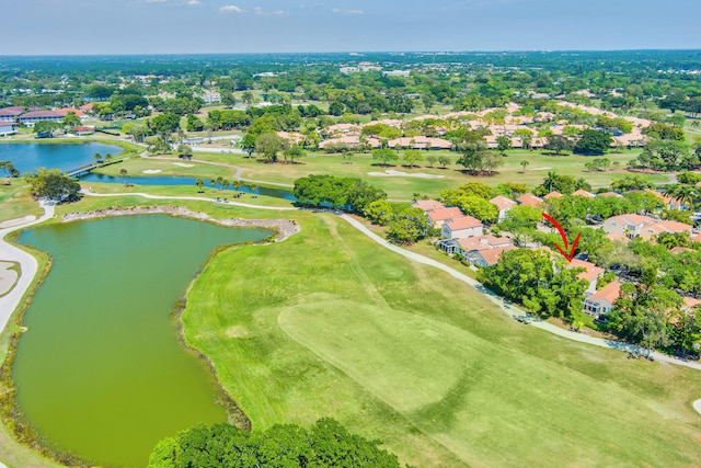 birds eye view of property with a residential view, a water view, and golf course view