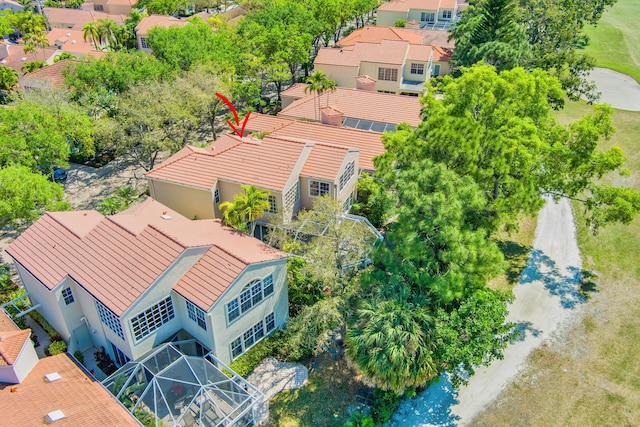 birds eye view of property with a residential view