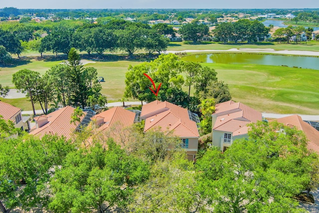 aerial view featuring view of golf course and a water view