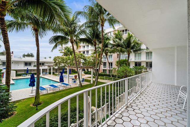 balcony featuring a pergola