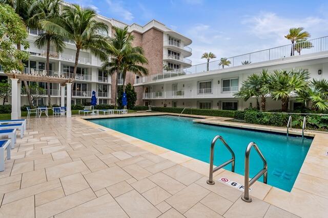 pool with a patio area