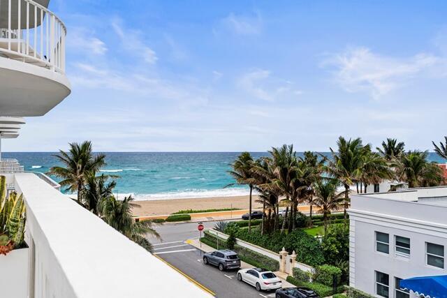 property view of water featuring a beach view