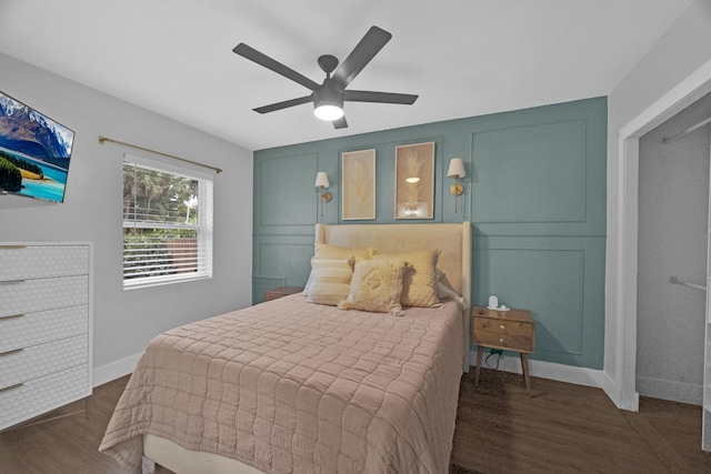 806 S 12th St, Fort Pierce, FL 34950 - bedroom featuring ceiling fan, dark wood-type flooring, and baseboards