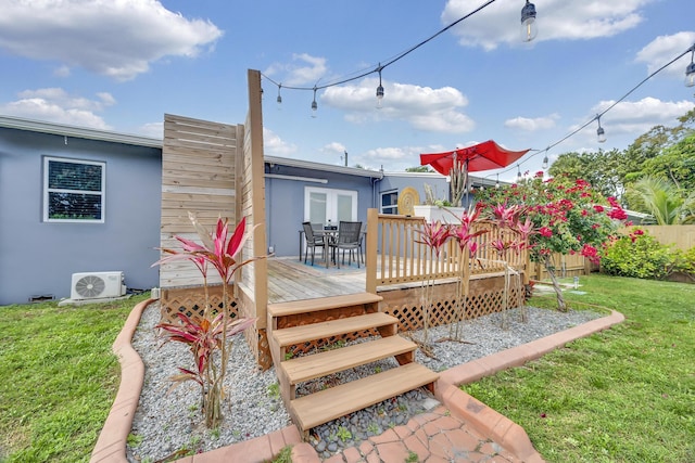 806 S 12th St, Fort Pierce, FL 34950 - wooden terrace featuring ac unit, outdoor dining area, and a yard