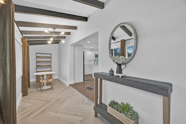 806 S 12th St, Fort Pierce, FL 34950 - hallway with a chandelier, visible vents, beamed ceiling, and baseboards