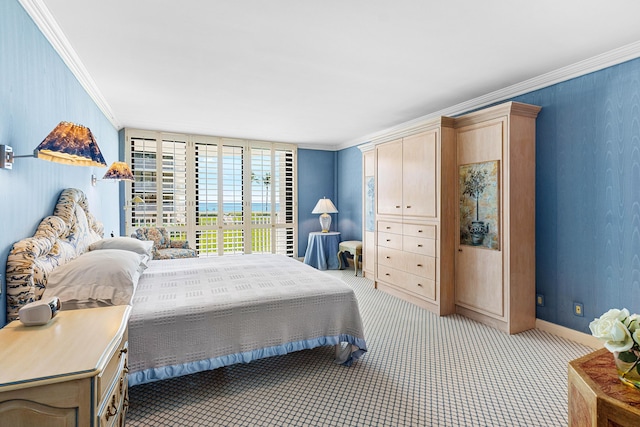 bedroom featuring crown molding, light colored carpet, and baseboards