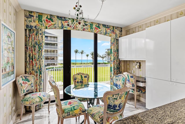 dining area with marble finish floor and wallpapered walls