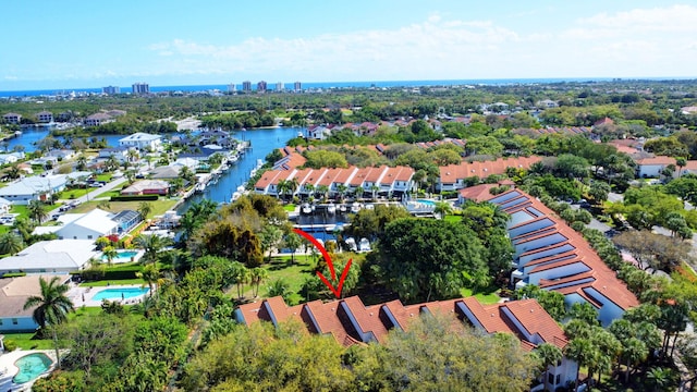 aerial view featuring a residential view and a water view