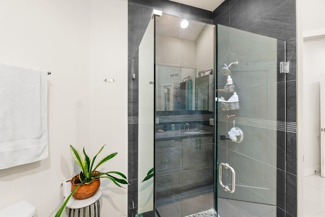 bathroom with a stall shower