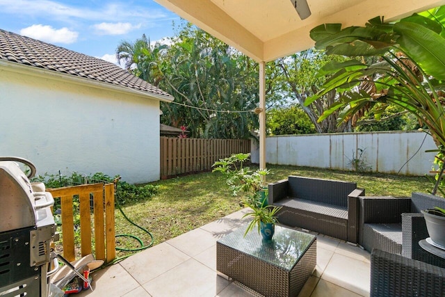 view of patio featuring outdoor lounge area and a fenced backyard