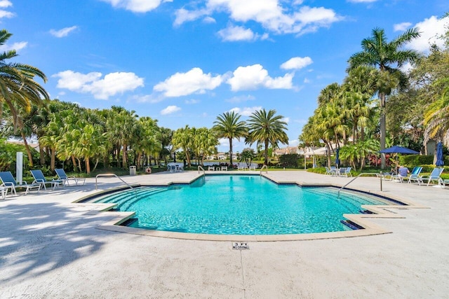 pool with a patio