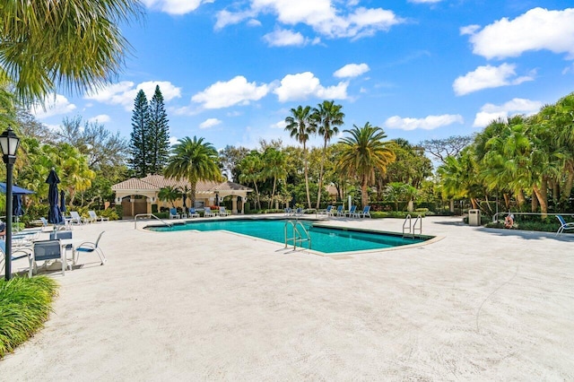 pool with a patio area