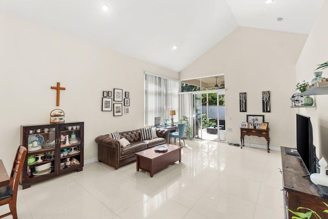 living room with light tile patterned floors, baseboards, high vaulted ceiling, and recessed lighting