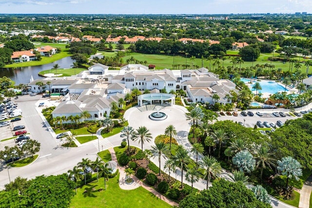 birds eye view of property featuring a water view and a residential view