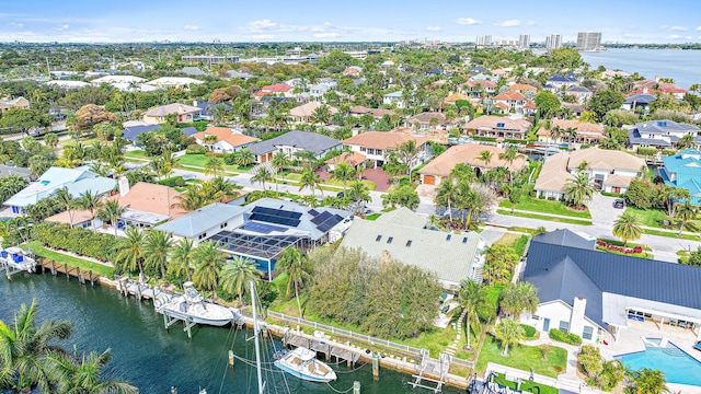 aerial view featuring a water view and a residential view