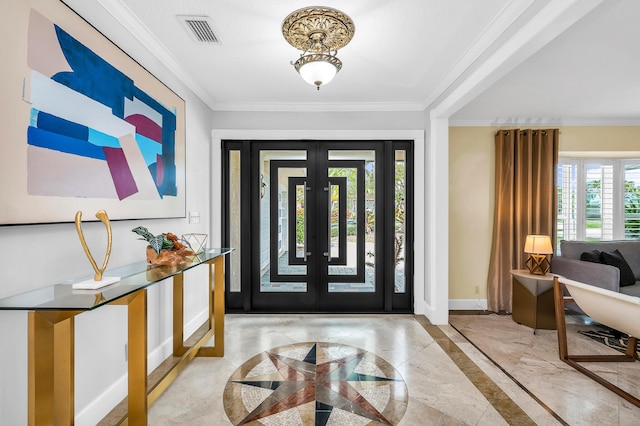 foyer entrance with visible vents, baseboards, marble finish floor, crown molding, and french doors