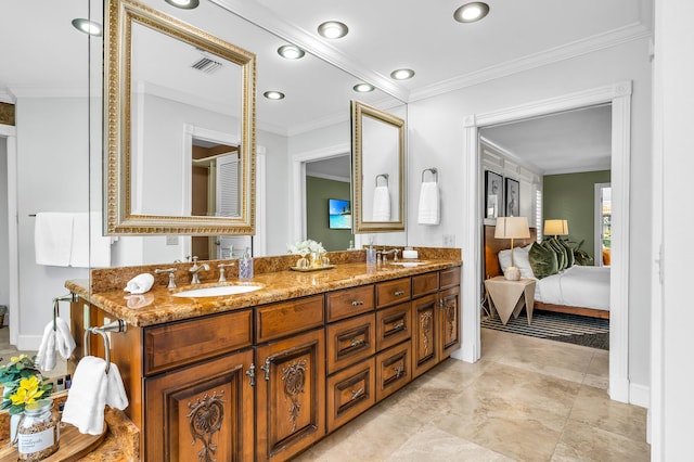 full bathroom featuring crown molding, visible vents, a sink, and double vanity