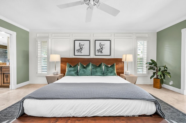 bedroom featuring baseboards, ceiling fan, and crown molding