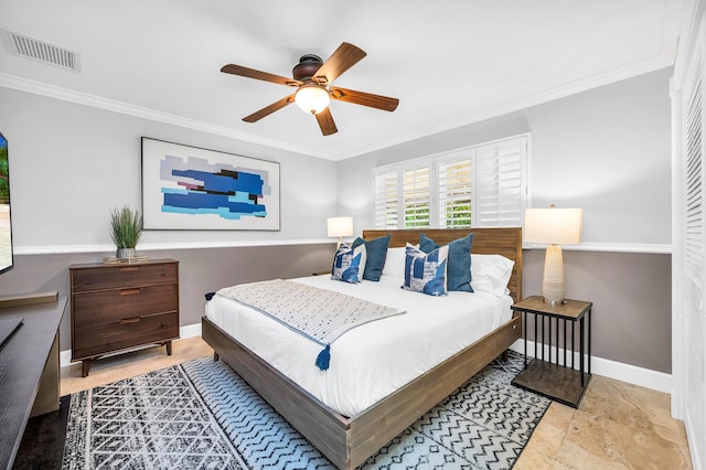 bedroom with visible vents, crown molding, baseboards, and ceiling fan