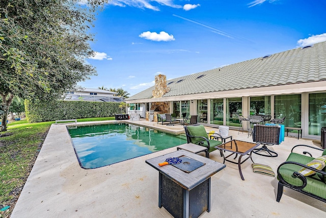 view of swimming pool featuring a fenced in pool and a patio area