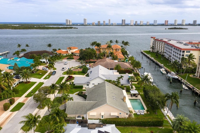 aerial view with a water view and a city view