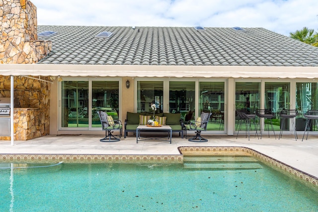 pool featuring a patio area