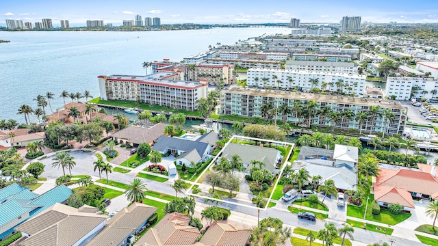 aerial view featuring a view of city and a water view