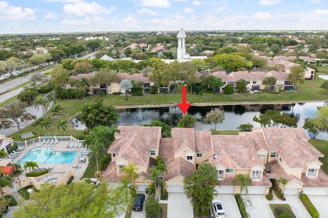 aerial view featuring a water view and a residential view